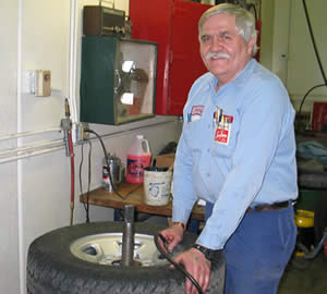 Man putting nitrogen in tire