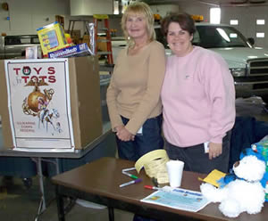 2 women & Toys for Tots