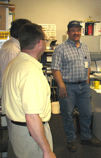 Brad Johnson welcomed Commissioner Tom Sorel and his staff to his office during a July 2 visit to District 1. Photo by John Bray