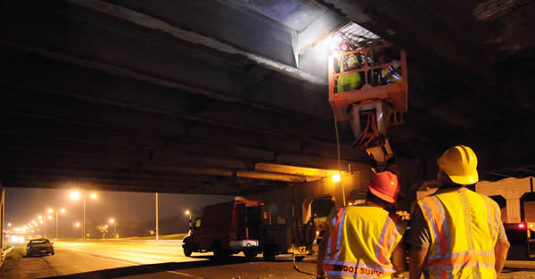 Crews work on bridge at night