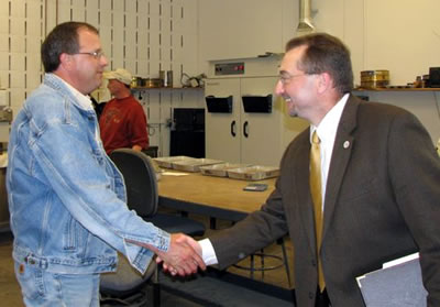 2 men shaking hands