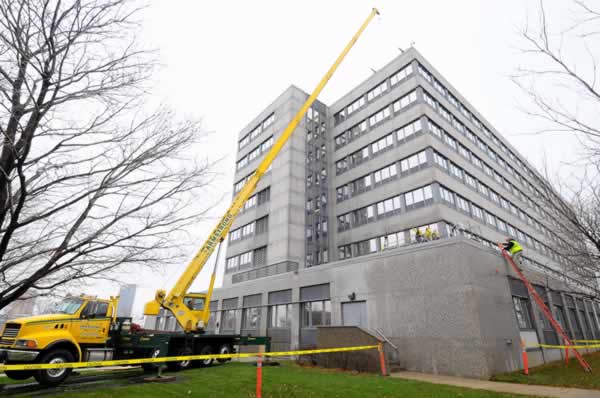 Exterior of transportation building being worked on