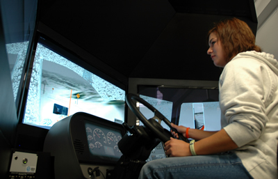 Woman in snowplow simulator