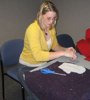 Woman making mitten
