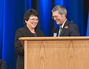 Photo of Nelrae Succio, former MnDOT District 6 engineer, receiving an award at the TZD Conference.