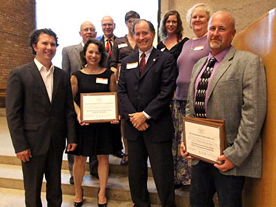 Photo of Carol Zoff, Tom Vesley, Commissioner Charlie Zelle and Betty Buckley receiving the Minnesota Preservation Award.