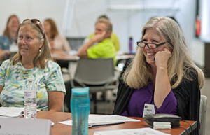 Photo of Susan Ronchak and Sandra Rike who attended the HR Summit at the Arden Hills Training Center Oct. 1.