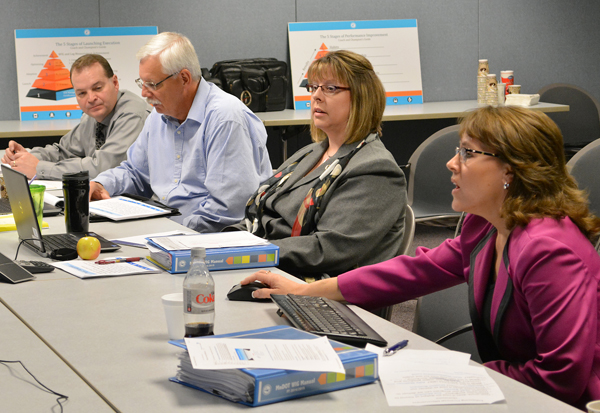 Photo of Trent Weber, Bill Roen, Tracy Hatch and Mary Prescott.