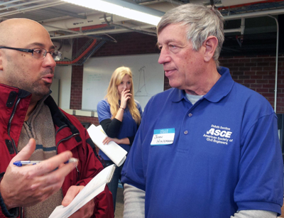 Photo of John Hinzmann during an interview with a reporter from the Duluth News Tribune.