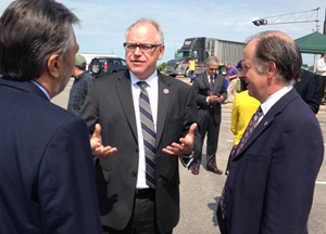 Photo of Jeff Vlaminck, Tim Walz and Charlie Zellie at Highway 43 Winona Bridge groundbreaking ceremony.