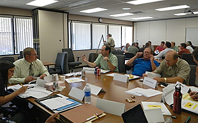 Photo of MnDOT staff meeting with manufactures in District 8.