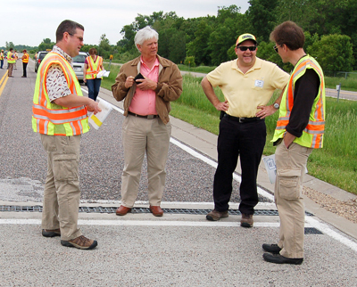 Photo of state and federal pavement experts at the MnROAD facility.