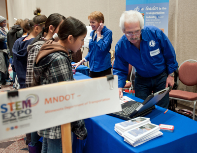 Photo of Sandy Caron and Gary Troge during last year’s Minneapolis STEM Expo.