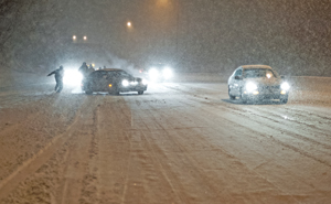 Photo of motorists in bad driving conditions.