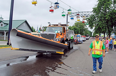 Photo of Paul Woodward walking in State Fair parade.