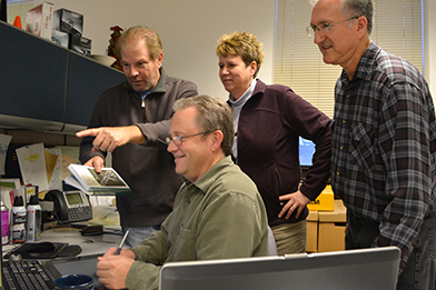 Photo of Joe Shultheis, Dave Sundberg, Laura Lochen and Gene Olchefske.