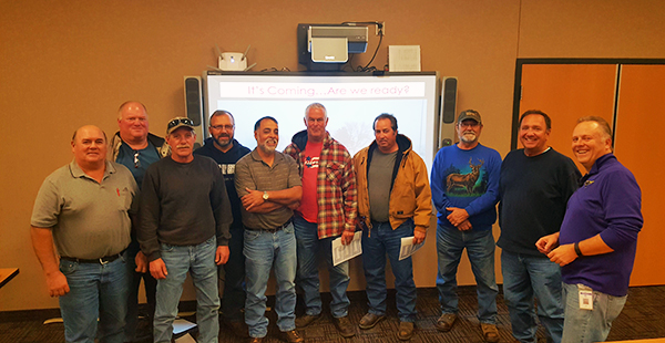 10 maintenance men in conference room