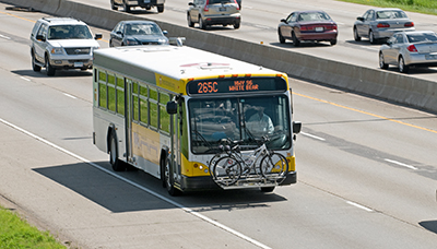 Photo of a bus on a  highway.