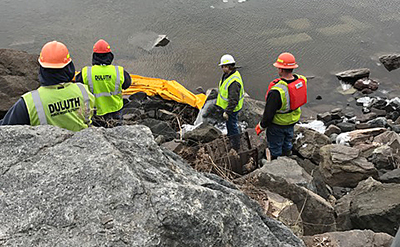 Crews working on drain in Duluth.