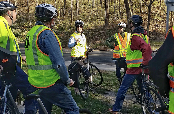 Melissa Barnes with design engineers on bikes.