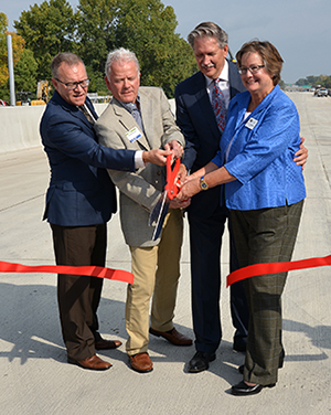 Photo of Scott McBride, Brad Wiersum, Jim Hovland and Molly Cummings.