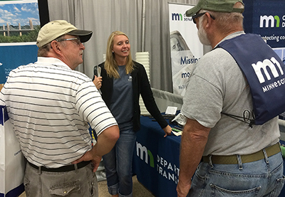 April Crocket at State Fair booth.