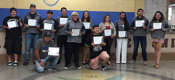 Photo of tribal graduates of the cement masons course.