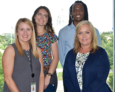 Photo of Liz Harens, Kirsten Henry, Lawrence Karongo and Brenda Rivera.