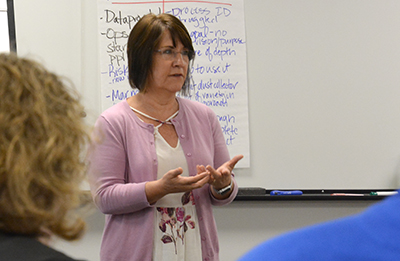 Woman presents to group