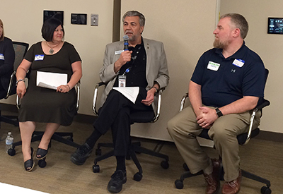 Photo of Jeff Vlaminck in a panel discussion.