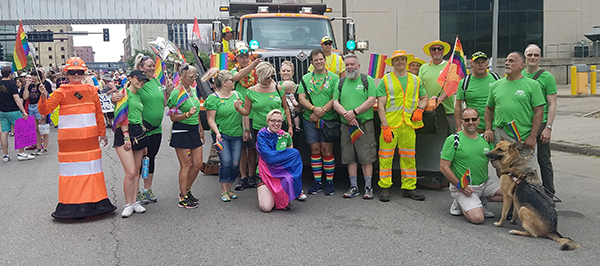 Photo of employees in PRIDE parade.