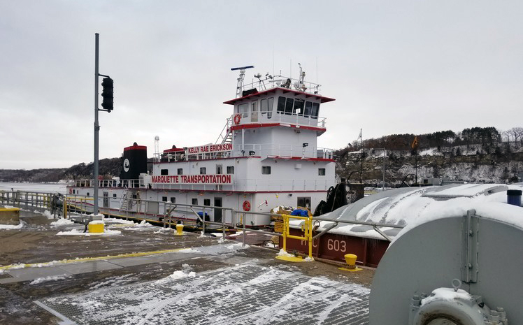 Photo: a river vessel proceeding through the locks