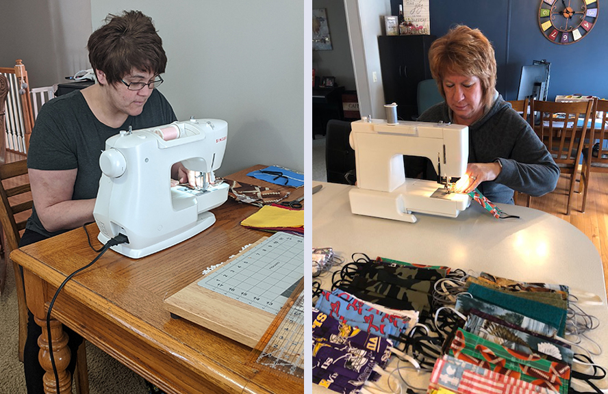 Two women seated at seperate sewing machines