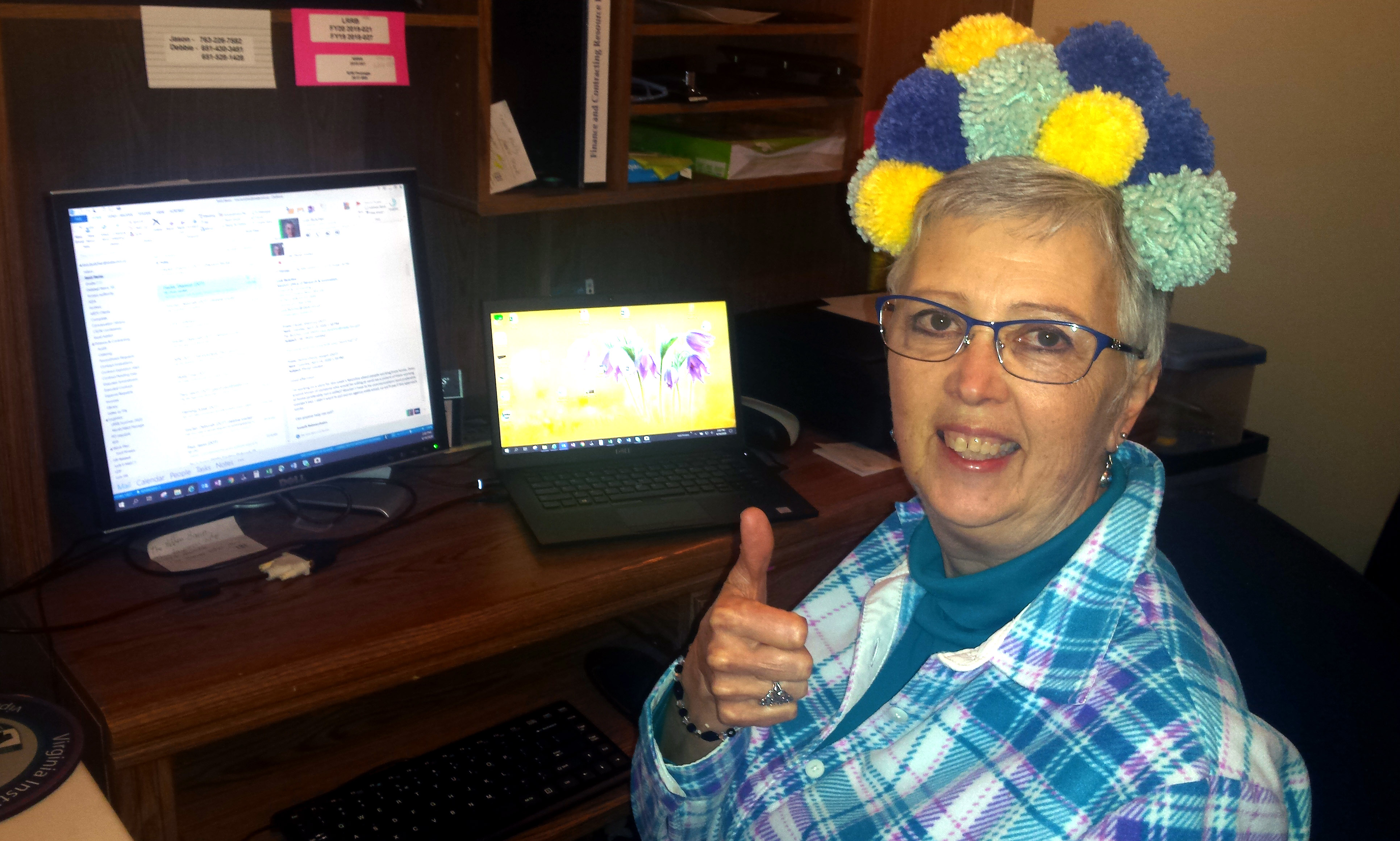 Photo: Pois Butcher, working at home while wearing a silly hat