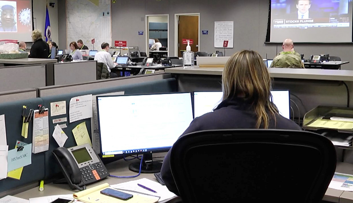 Photo: people working in the basement of the SEOC