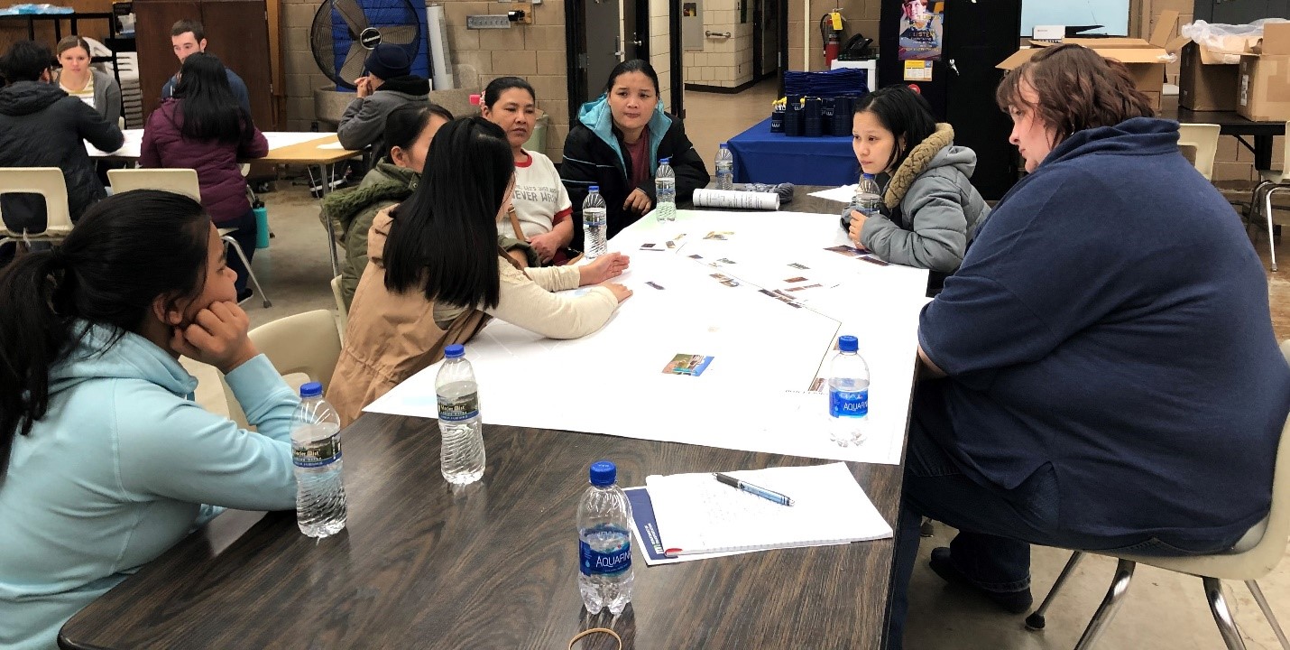 Photo: A group of people seated at a table