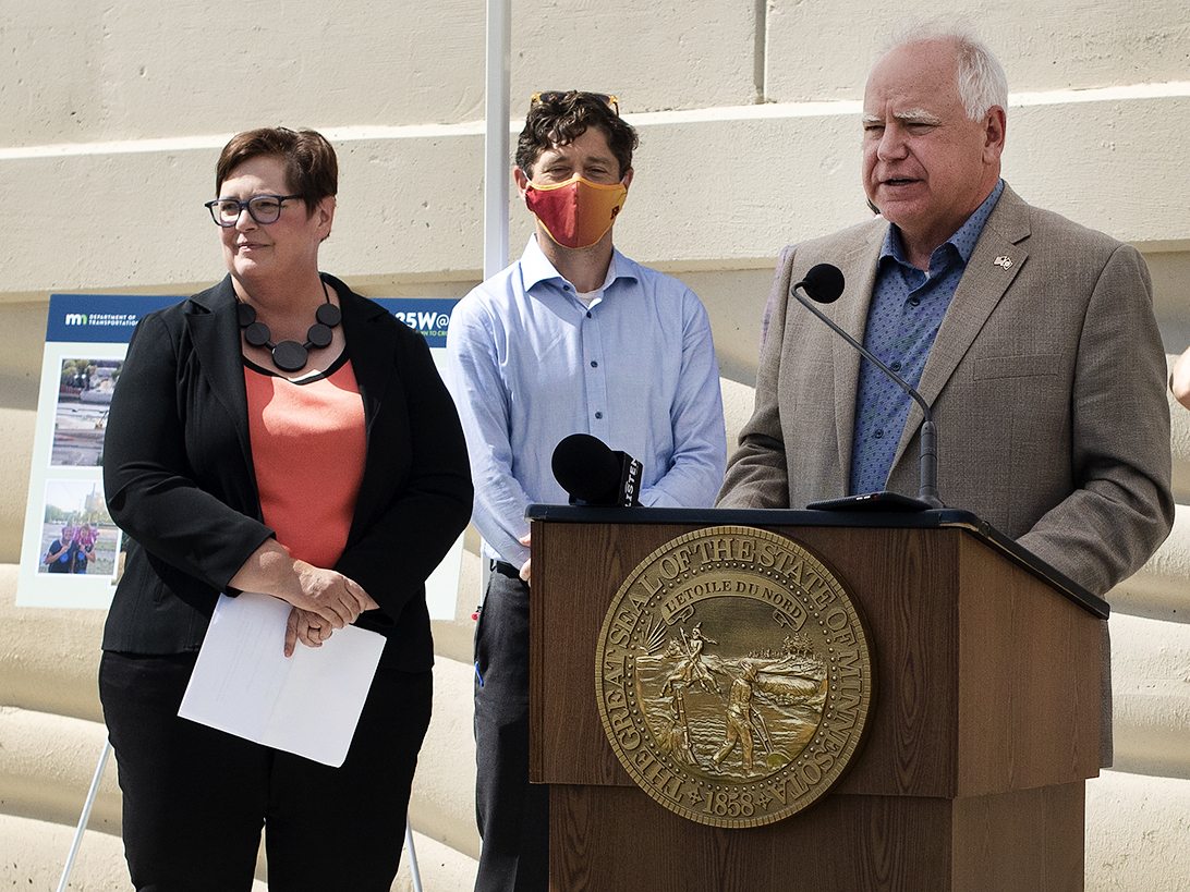 Photo: Commissioner Margaret Anderson Kelliher standing near Gov. Tim Walz