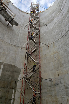 Photo: LDP participants climb down into 35W Stormwater Storage Facility. 