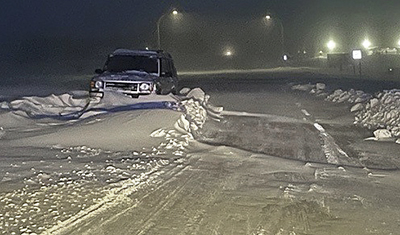 Photo: Vehicle stuck in a snow drift.