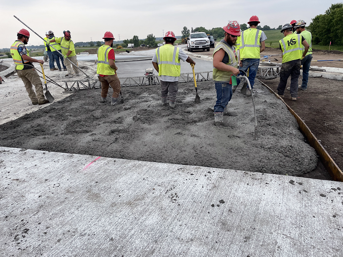 Photo of a crew working with concrete