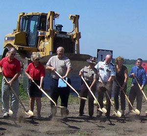 Jim Swanson, Mankato district engineer (third from left) joined business leaders, law enforcement agents and elected officials in the official groundbreaking for the reconstruction of Hwy 14 around Waseca. Photo by Rebecca Arndt