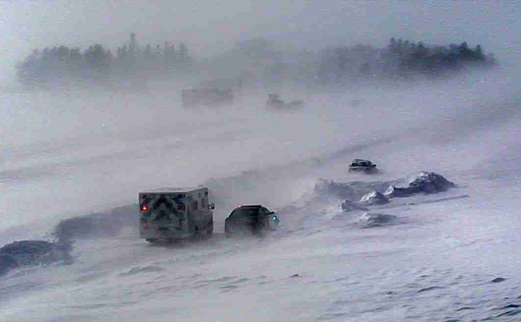 Sever winter landscape, with blowing snow that makes it difficult to travel