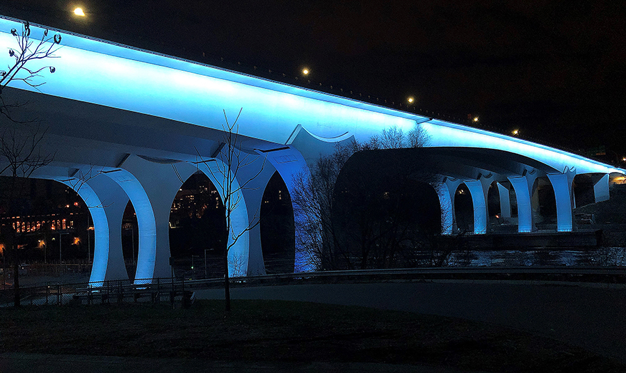 photo: The I-35W bridge, lit up in blue