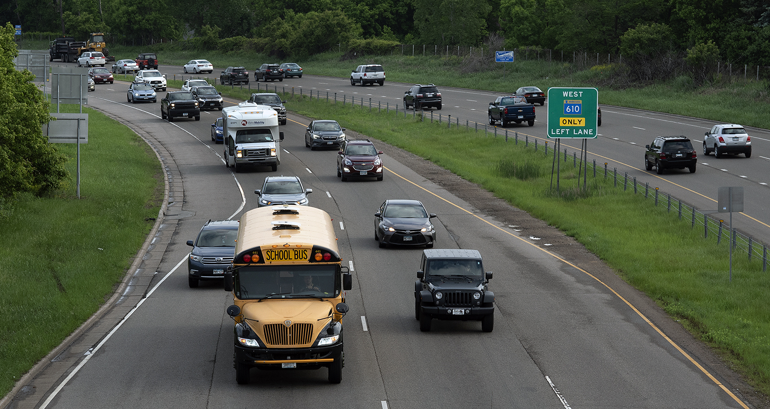 Photo: a variety a vehicles travelling on a freeway
