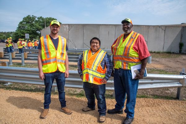 A group ohoto of three MnDOT workers