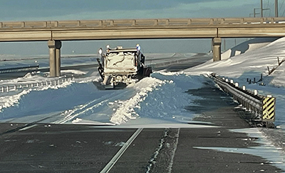Photo: Snowplow clearing a drift.